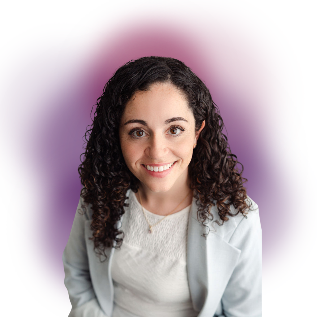 Smiling woman with curly dark hair in a light blazer, portrait against a purple gradient background.